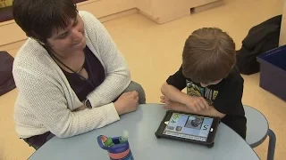 Non-verbal children living with autism learning to communicate via electronic devices