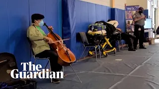 Yo-Yo Ma plays cello in vaccine waiting room in Massachusetts