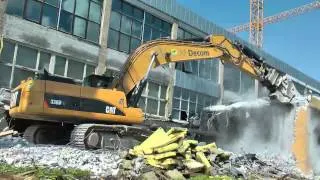 Cat 336DL Demolishing a small building