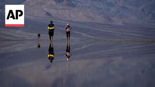 Kayakers paddle in Death Valley after rains replenish lake in one of Earth's driest spots