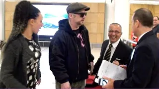 BOY GEORGE LOOKS FED UP WITH PHOTOGRAPHERS AS HE ARRIVES IN SYDNEY FOR THE VOICE AUSTRALIA