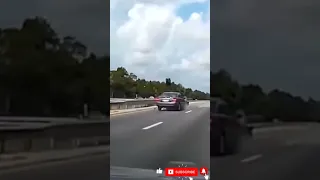 A Tyre from the 18 Wheeler Destroyed Toyota Camry.