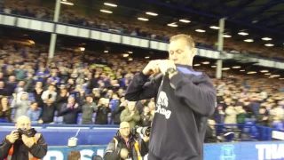 Duncan Ferguson throws his kit into the crowd