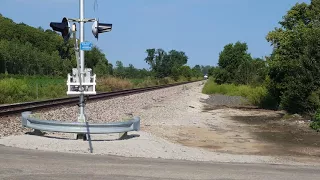 A late Southwest Chief with 3 units highballs thru crossing at 70+mph!!