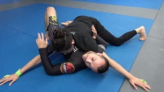 Reclaiming underhook half guard by off balancing your opponent (Lachlan Giles)