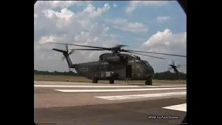 Engine start and take off. Two German Army CH-53 helicopters.