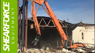 ShearForce Rotating Demolition Pulverizer At Work Demolishing Industrial Facility