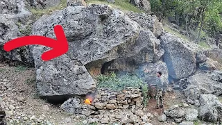 A shelter under the mountain cliffs