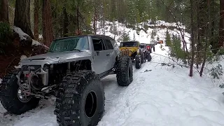 Broken Jeep gets pulled out of deep snow