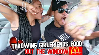 THROWING MY HUNGRY GIRLFRIEND FOOD OUT THE WINDOW TO SEE HOW SHE REACTS!! ( BAD IDEA)