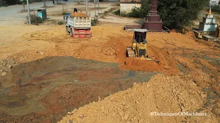 Dozer Pushing Spreading Soil And Dump Trucks Unloading Soil Complete Connection Processing