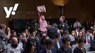 Protesters demanding a Gaza ceasefire interrupt Senate hearing on funding for Israel
