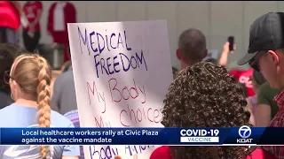 Local healthcare workers rally at Civic Plaza against the state's vaccine mandate