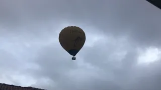 Hot air balloon flies over our house