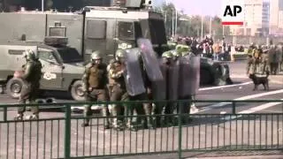 Students clash with police as they march to demand educational reform