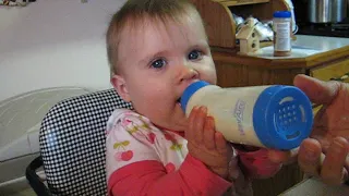 Teasing Lilly with bottle. Recorded January 27, 2008