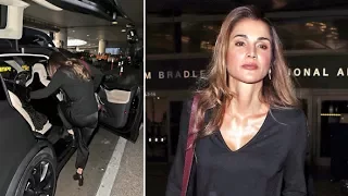 Queen Rania Of Jordan Hops Into A Matte Black Tesla Upon Arrival In Los Angeles