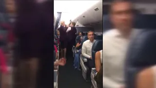 Disgruntled passengers forced to wait on tarmac for hours on flight to Miami