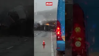 Horror moment lorry falls from overpass on top of already crashed vehicles #Shorts