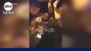 Wrongful arrest of man holding baby inside a restaurant | GMA