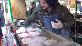 Huge Burgers Covered with Melted Cheese and Sauces. London Street Food, Soho