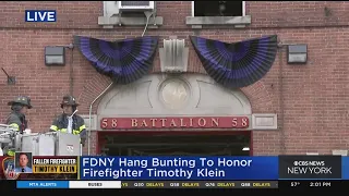 FDNY hangs bunting to honor Firefighter Timothy Klein