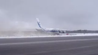 AN-124 chuggalugging back onto the runway in CYQX-Gander