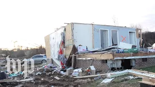 On one street in Kentucky, a family loses four children after the tornado