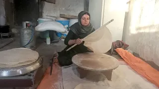 Baking a unique village bread called (noon tiri) by rural woman (iran2023)