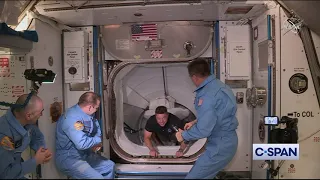 NASA Astronauts Bob Behnken and Doug Hurley enter the International Space Station
