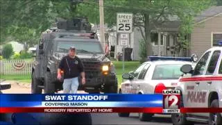 SWAT standoff ends with two arrests