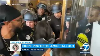 Protesters demand LA councilmen resign, face off with LAPD outside City Hall