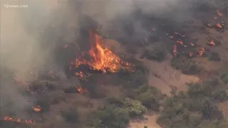 Valley residents share experiences as brush fire burns near homes