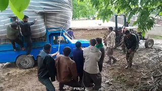 Trapped in a heavy truck on a rainy day and helping the people of the village and saving them