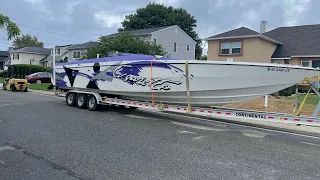 Cigarette boat restoration: Backing the boat back into it spot 42’ cigarette