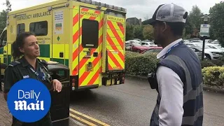 Traffic warden gives ticket to AMBULANCE parked on yellow line