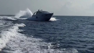 Pershing 5X yacht passing FULL SPEED VERY CLOSE to another yacht - view from inside