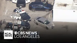 Stolen vehicle suspect barricades inside car at end of pursuit in San Pedro