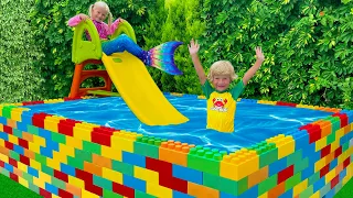 Katya and Dima How to Swim in the Kids Pool and Plays with Fun Water Toys