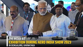 PM Modi at exhibition during Aero India Show 2023 in Bengaluru, Karnataka