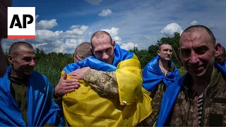 Ukrainian soldiers captured by Russia return home as part of prisoner exchange