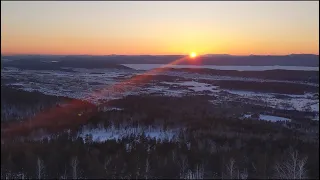 Закат над Уральскими горами зимой. Лысая гора. Маршрут, вид с горы на Миасс, озеро Тургояк.