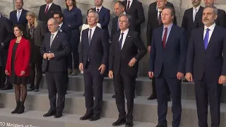 NATO ministers pose for photo during Brussels meeting on long-term military help for Ukraine