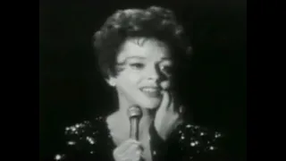 Judy Garland performs the definitive version of "Smile"