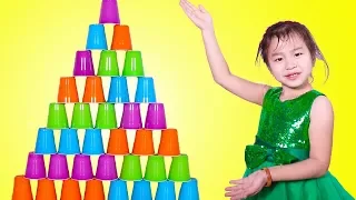 Jannie Stacking A HUGE Cup Pyramid