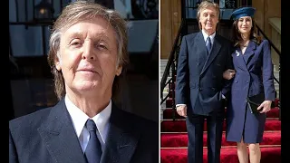 Sir Paul McCartney, 75, supported by wife Nancy Shevell, 58, as he's made a Companion of Honour  - 2