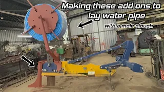 Fabricating pipe reel to lay water pipe with mole plough