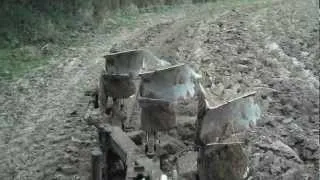 Massey Ferguson 590 ploughing with TSR103