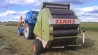 Про сено заготовку и рулонный пресс claas.