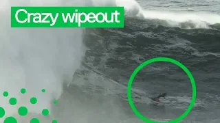 Surfer Rescued after Huge Wipeout in Nazare, Portugal